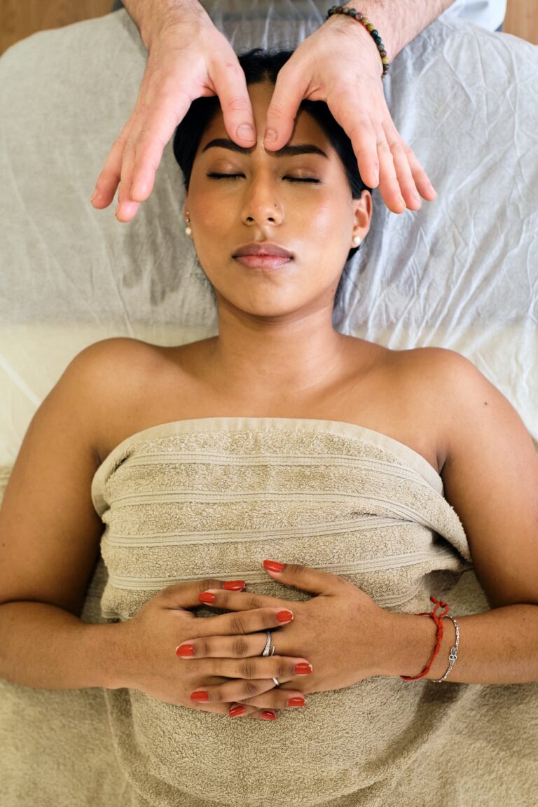Young hispanic woman lying down for massage.